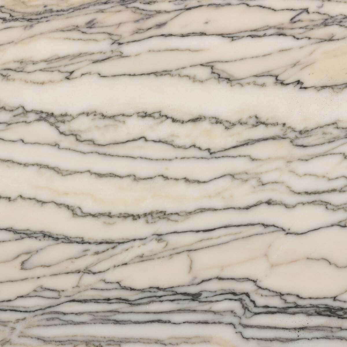 Close up of top of Four Hands Eisen Nightstand in Wavy White Marble on a white background at Addison West