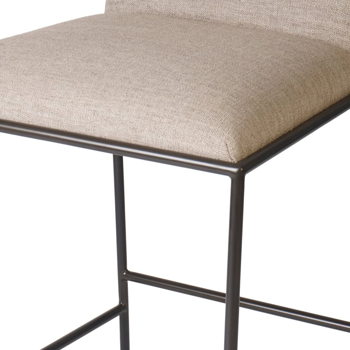 Close up of Four Hands Elba Counter Stool in Alcala Wheat on a white background at Addison West