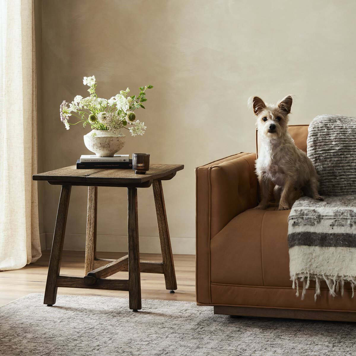 Four Hands Elio End Table in Burnt Bleached Oak in a living room at Addison West