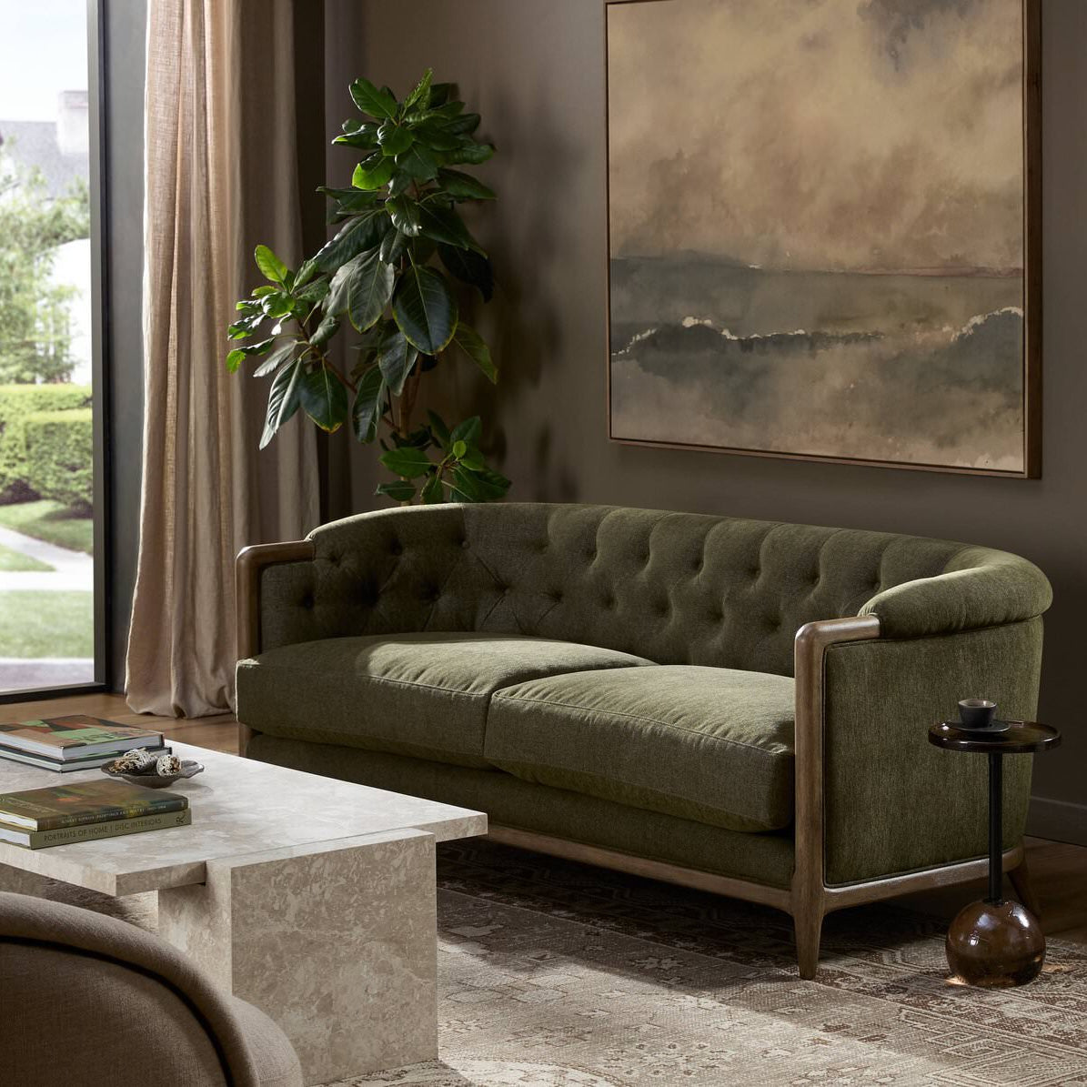 Four Hands Ellsworth Sofa in Sutton Olive in a living room at Addison West