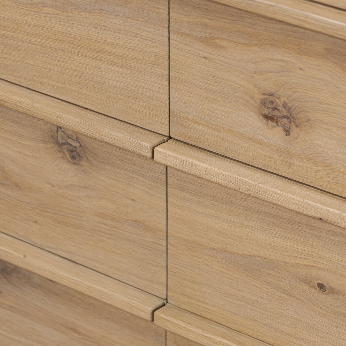 Close up of Four Hands Emmer 6 Drawer Dresser in Aged Smoked Oak Veneer on a white background at Addison West