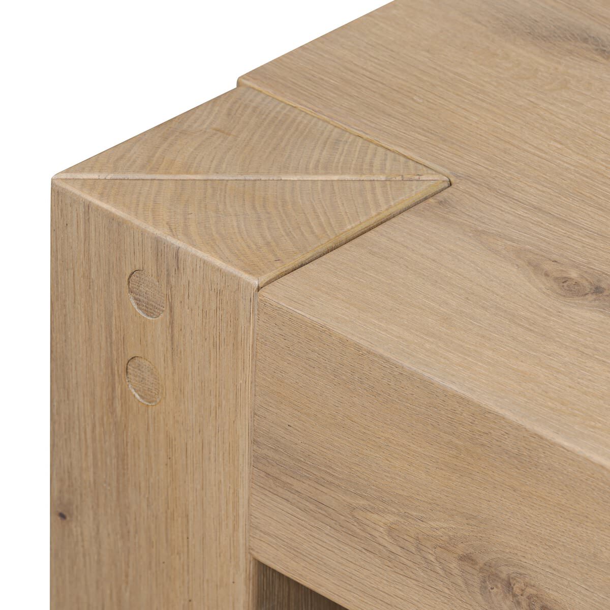 Close up of Four Hands Emmer Coffee Table in Aged Smoked Oak on a white background  at Addison West