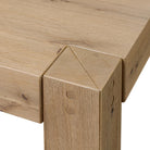 Close up of Four Hands Emmer Coffee Table in Aged Smoked Oak on a white background  at Addison West