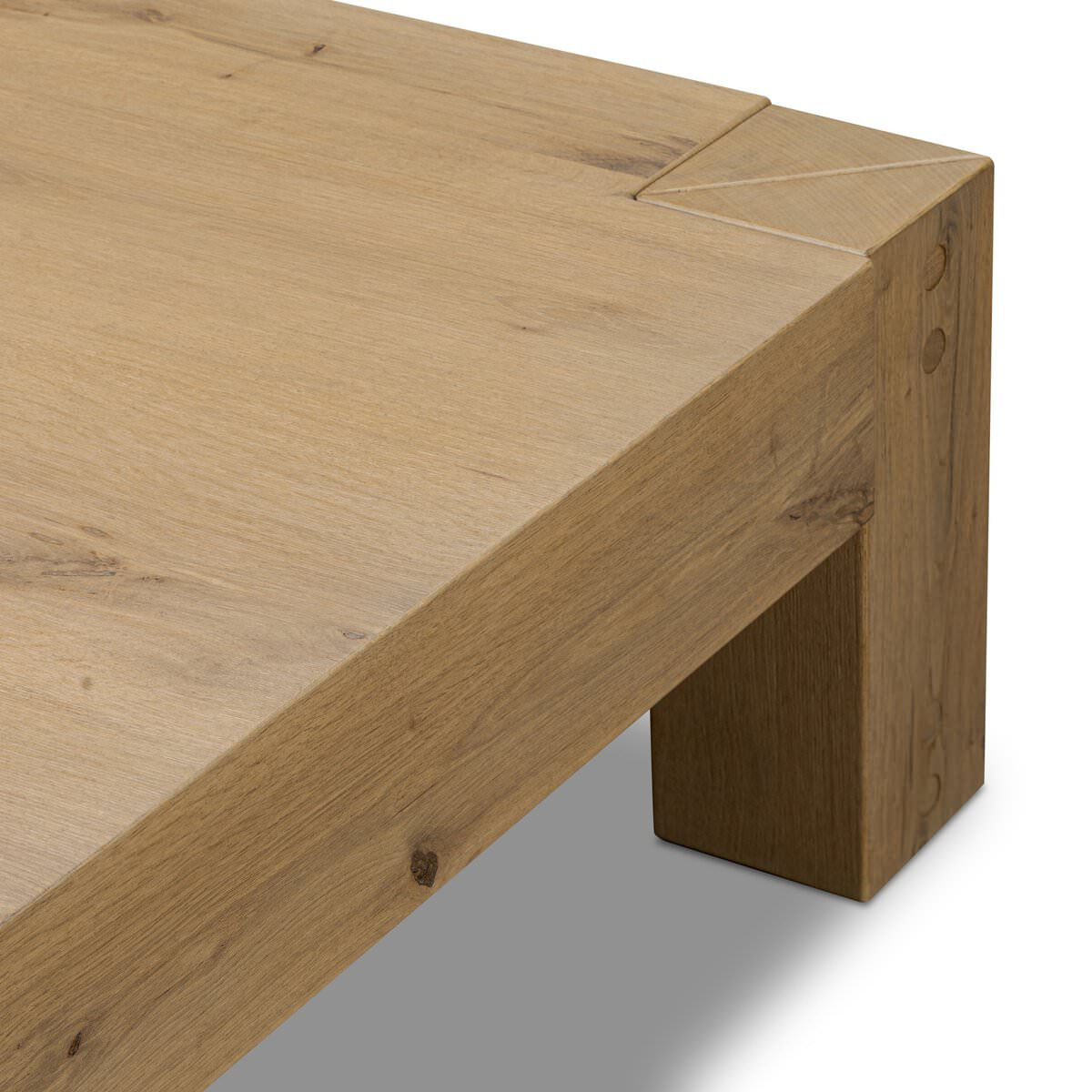 Close up of Four Hands Emmer Coffee Table in Aged Smoked Oak on a white background  at Addison West