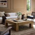 Four Hands Emmer Coffee Table in Aged Smoked Oak in a living room at Addison West