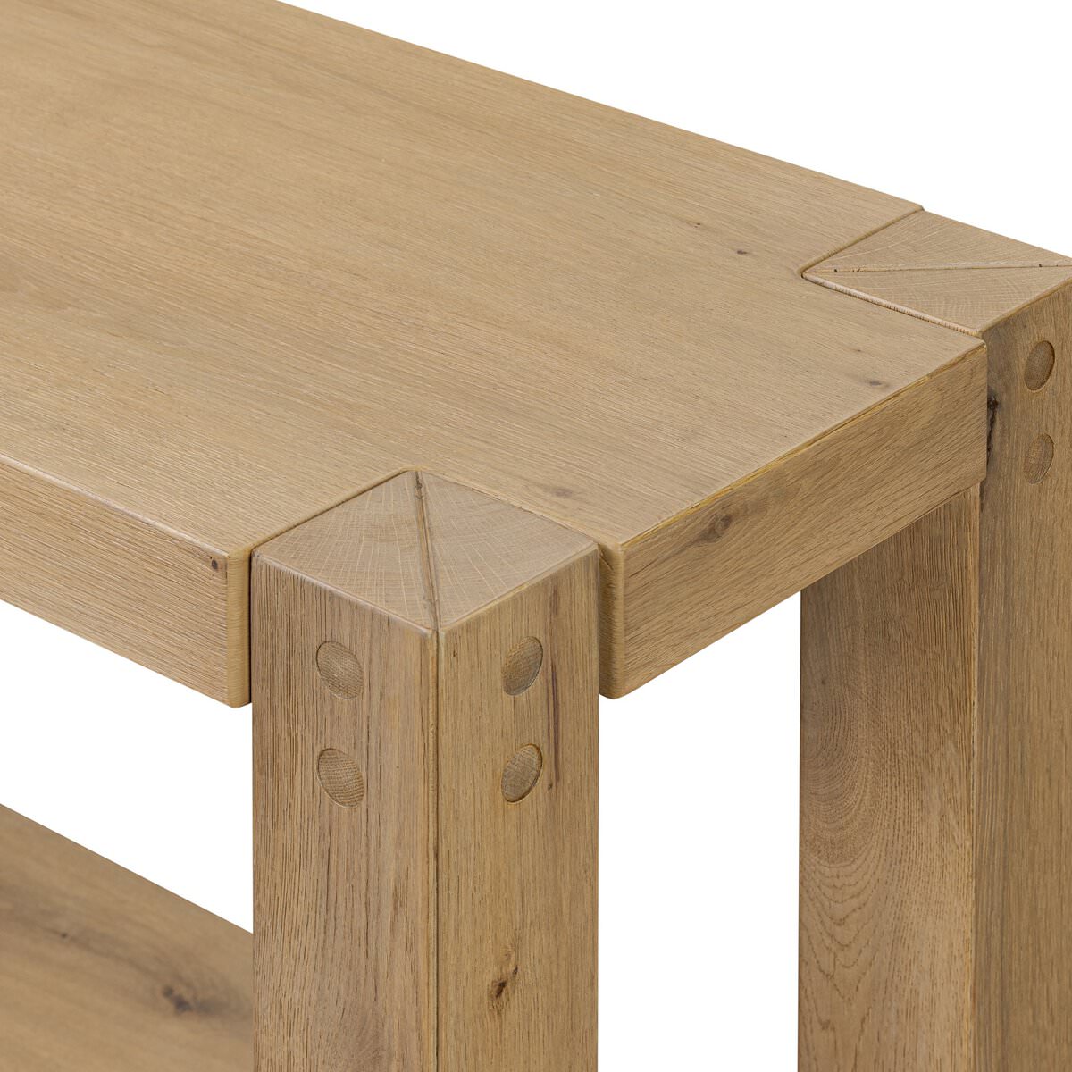 Close up of Four Hands Emmer Console Table in Aged Smoked Oak on a white background at Addison West