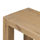 Close up of Four Hands Emmer Console Table in Aged Smoked Oak on a white background at Addison West