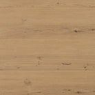 Top of Four Hands Emmer Dining Table in Aged Smoked Oak on a white background at Addison West