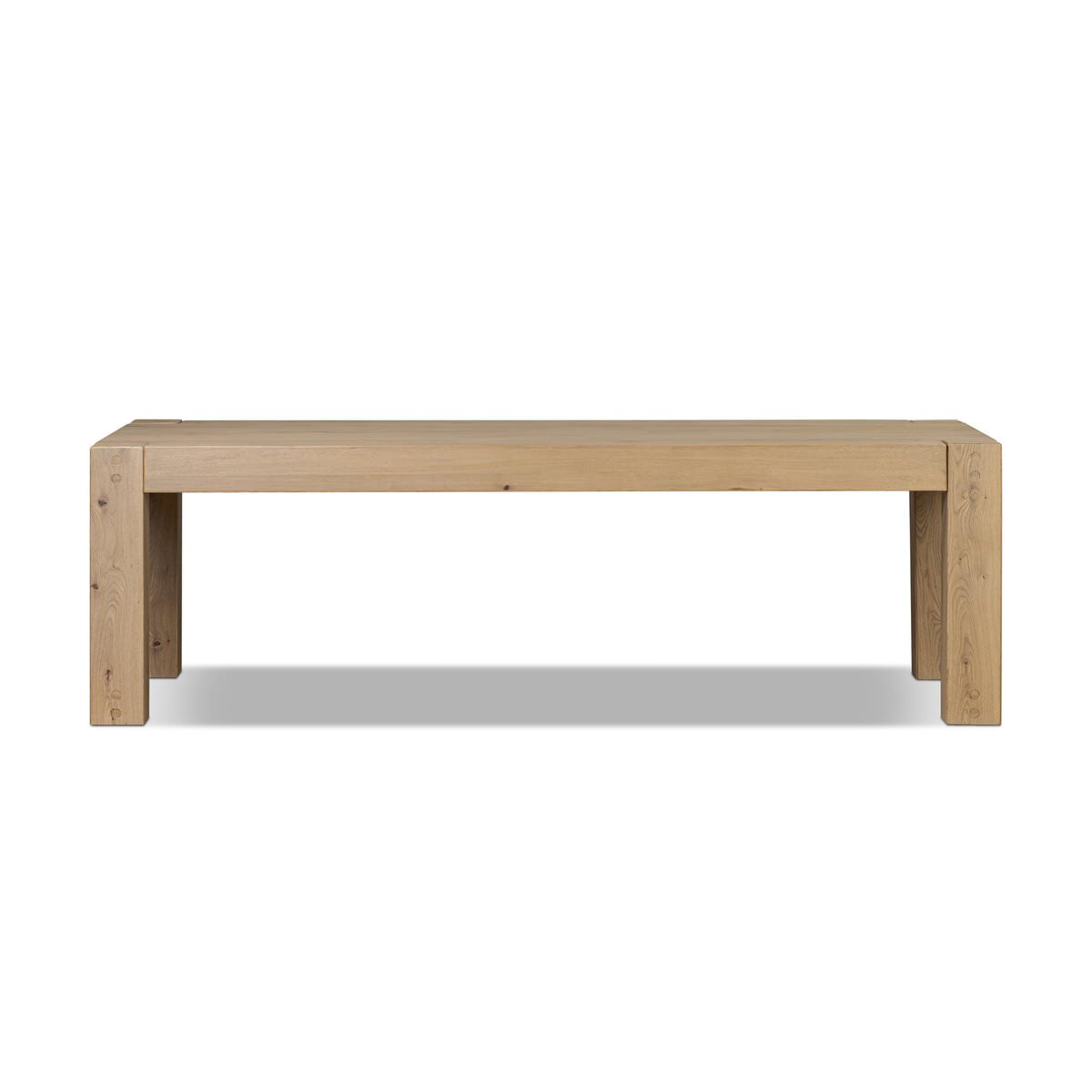 Four Hands Emmer Dining Table in Aged Smoked Oak on a white background at Addison West