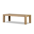 Four Hands Emmer Dining Table in Aged Smoked Oak on a white background at Addison West