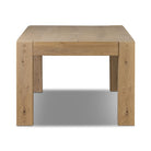 Four Hands Emmer Dining Table in Aged Smoked Oak on a white background at Addison West