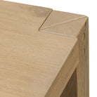 Close up of Four Hands Emmer End Table in Aged Smoked Oak on a white background at Addison West