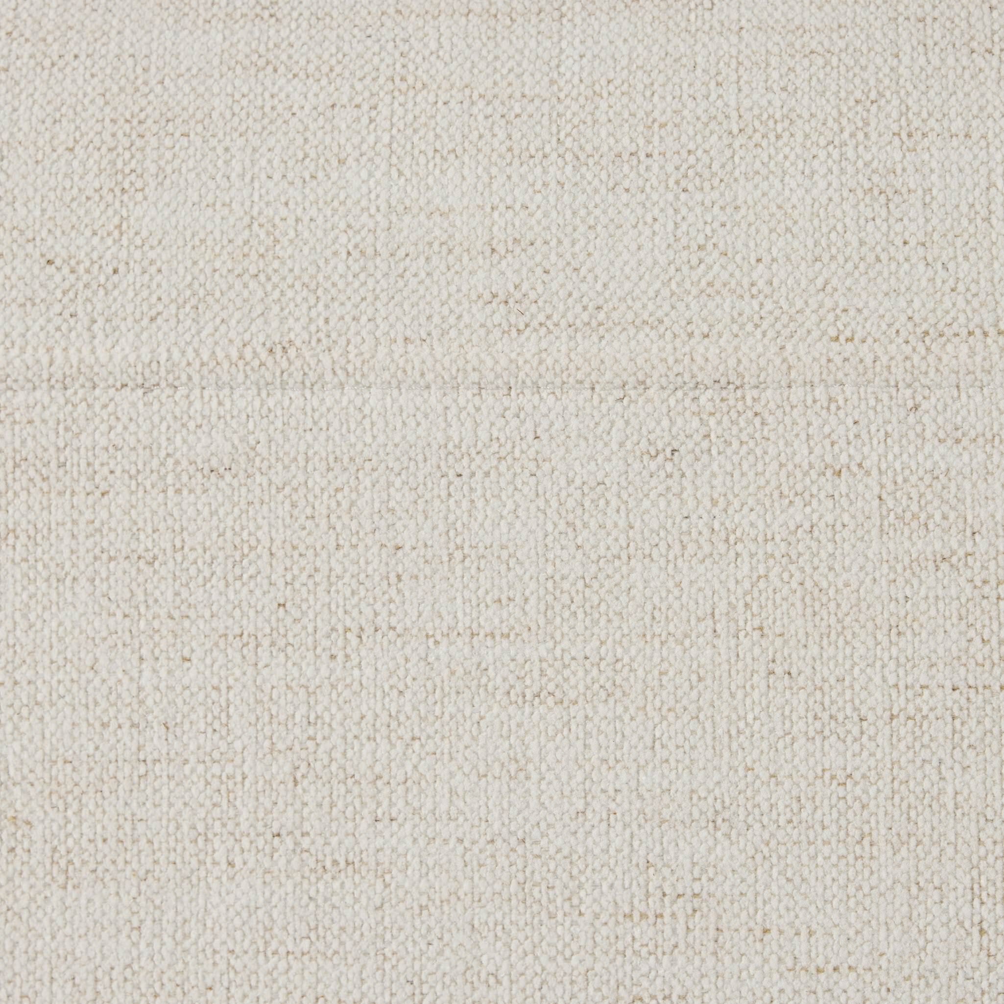 Close up of the fabric from the Four Hands Fane Bed in Crypton Nomad Snow, Queen on white background at Addison West.
