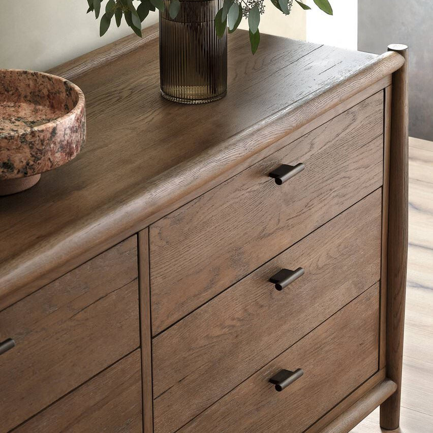 Close up of Four Hands Glenview 6 Drawer Dresser in Weathered Oak Veneer on a white background at Addison West