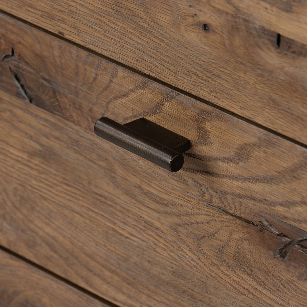 Close up of Four Hands Glenview 9 Drawer Dresser in Weathered Oak Veneer on a white background at Addison West