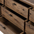 Close up of Four Hands Glenview 9 Drawer Dresser in Weathered Oak Veneer on a white background at Addison West