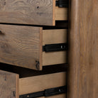 Close up of Four Hands Glenview 9 Drawer Dresser in Weathered Oak Veneer on a white background at Addison West