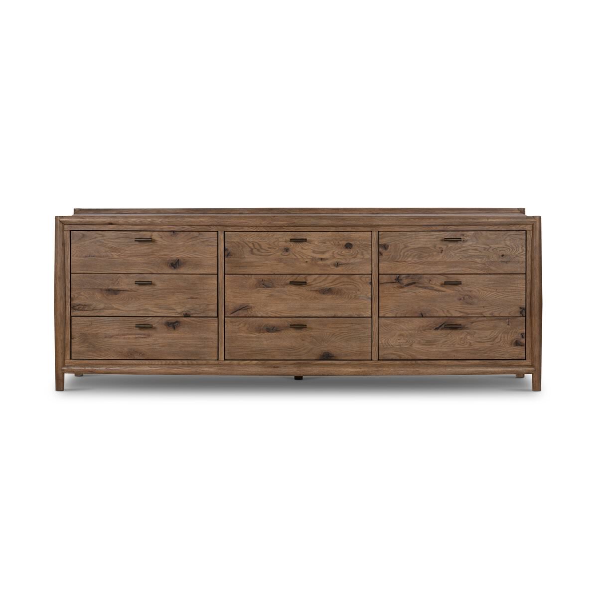 Four Hands Glenview 9 Drawer Dresser in Weathered Oak Veneer on a white background at Addison West
