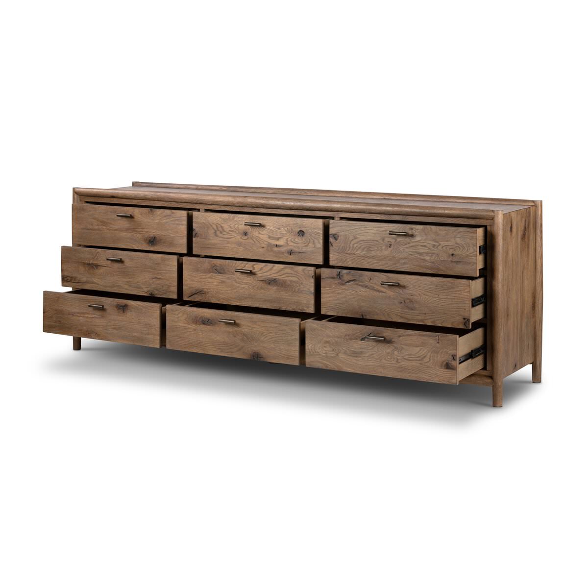 Four Hands Glenview 9 Drawer Dresser in Weathered Oak Veneer on a white background at Addison West