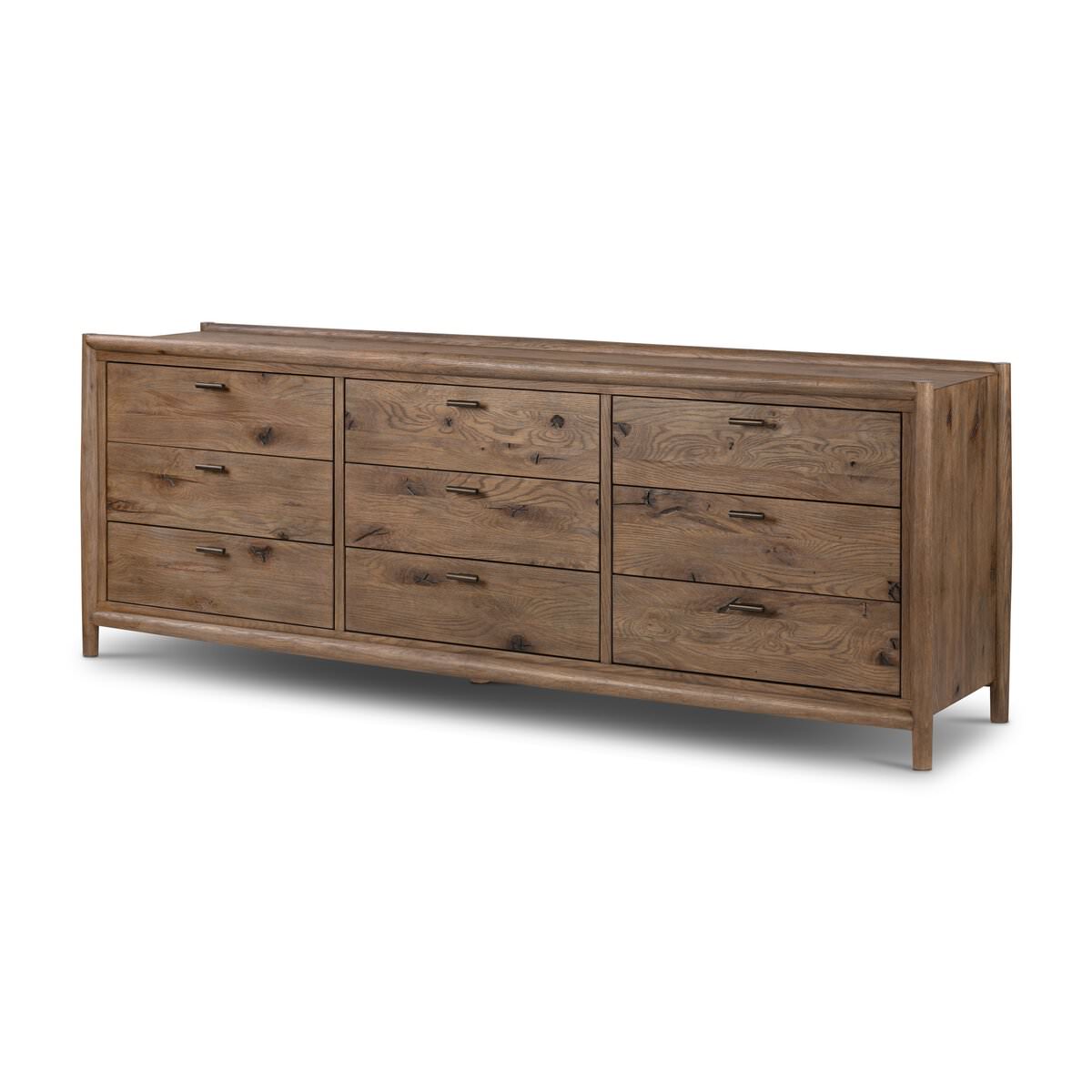 Four Hands Glenview 9 Drawer Dresser in Weathered Oak Veneer on a white background at Addison West