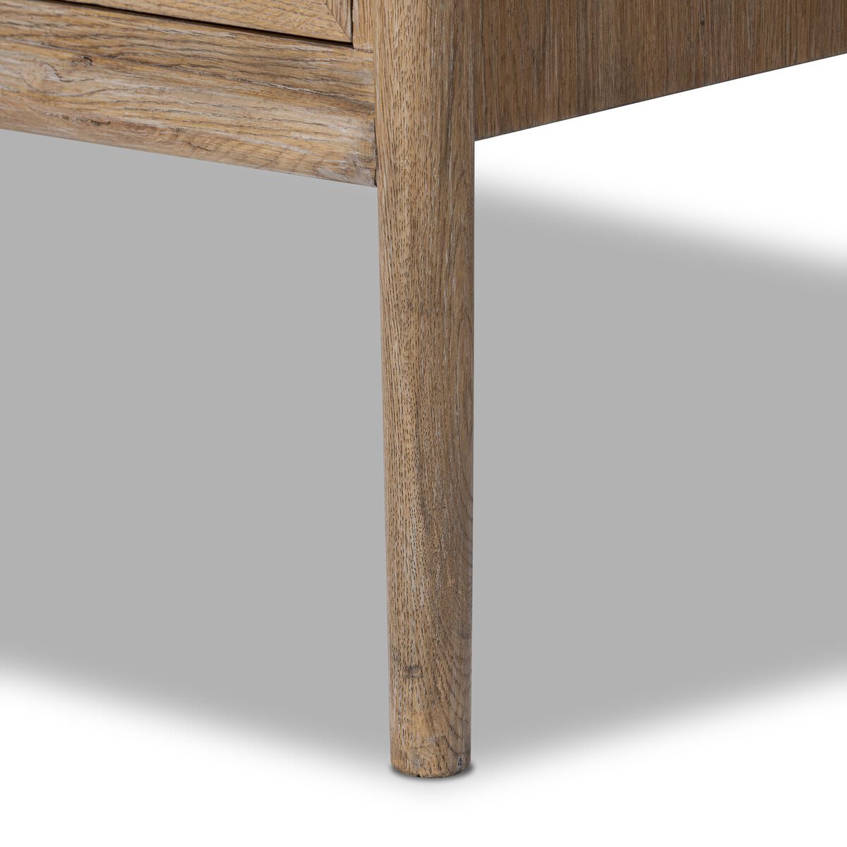 Close up of Four Hands Glenview Bar Cabinet in Weathered Oak on a white background at Addison West