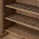 Close up of Four Hands Glenview Bar Cabinet in Weathered Oak at Addison West
