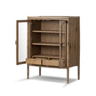 Four Hands Glenview Bar Cabinet in Weathered Oak on a white background at Addison West