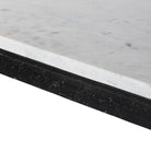 Close up of Four Hands Hammered Iron Console Table in White Marble on a white background at Addison West