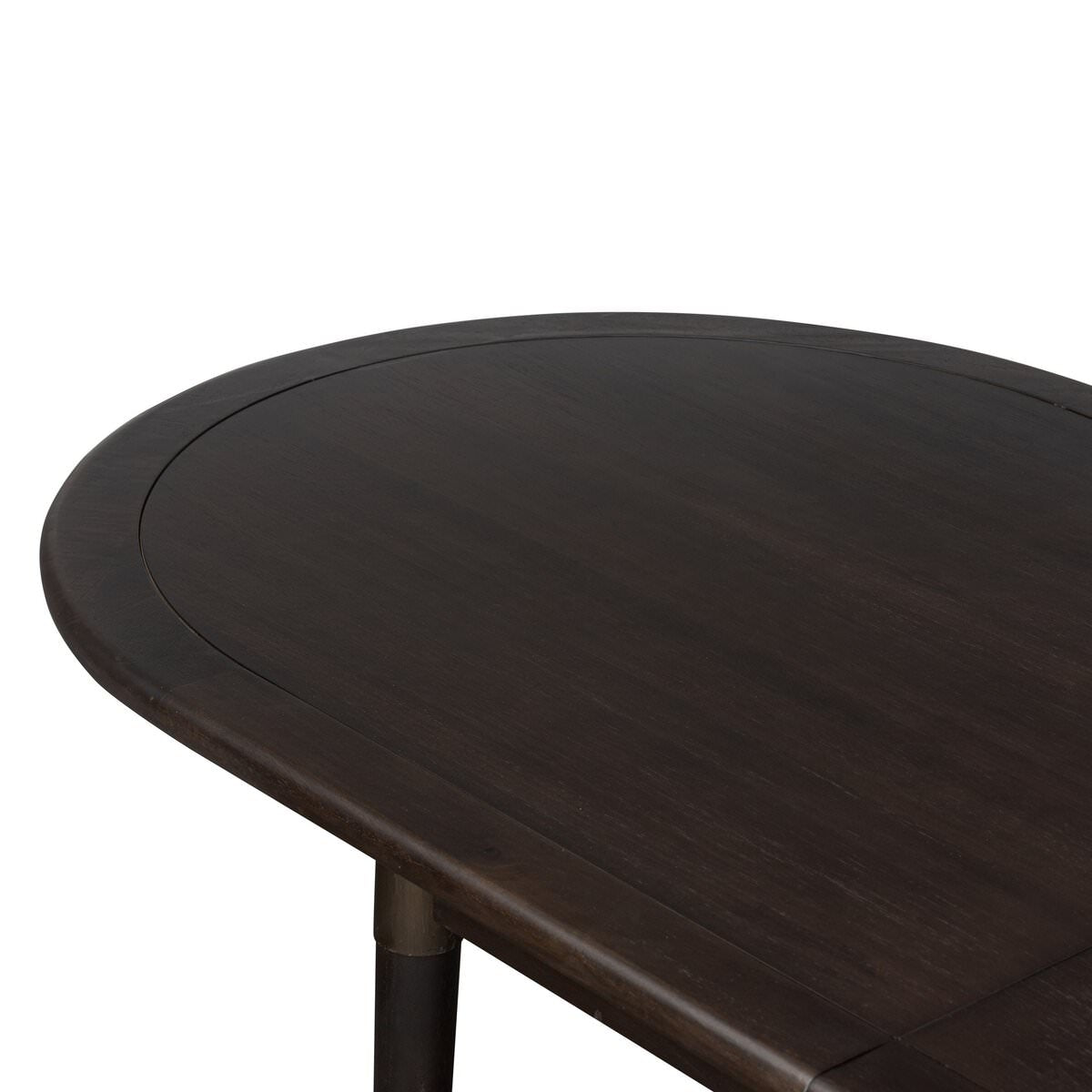 Close up of Four Hands Harper Oval Extension Dining Table 84-104" in Black Mango Veneer on a white background at Addison West