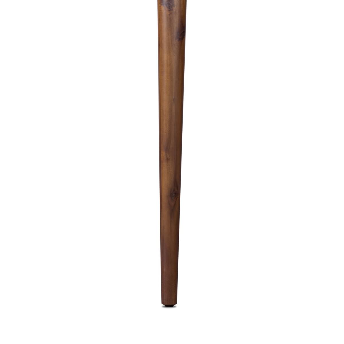 Close up of leg of Four Hands Harper Oval Extension Dining Table 84-104" in Toasted Walnut on a white background at Addison West