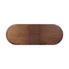 Top of Four Hands Harper Oval Extension Dining Table 84-104" in Toasted Walnut on a white background at Addison West