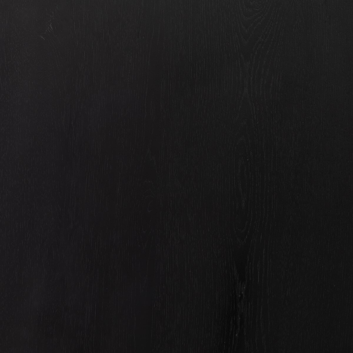 Close up of Four Hands Humphrey Round Coffee Table in Coal on Oak on a white background at Addison West