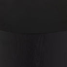 Close up of Four Hands Humphrey Round Coffee Table in Coal on Oak on a white background at Addison West