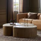 Four Hands Ingrid Coffee Table in Cappuccino Marble in a green living room at Addison West