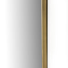 Close up of Four Hands Jacques Mirror in Antique Brass on a white background at Addison West