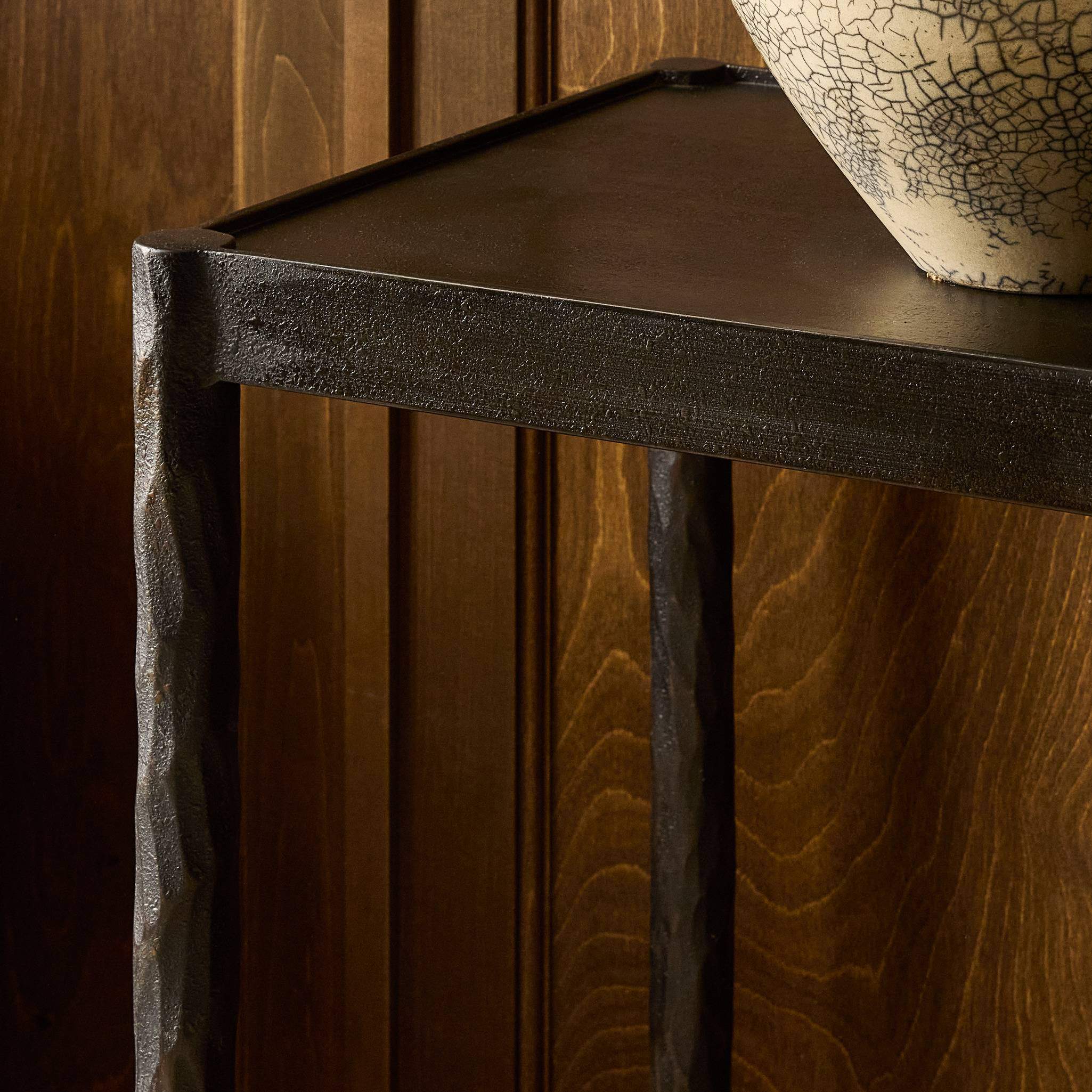 Four Hands Jade Console Table Textured Bronze in dining room at Addison West.