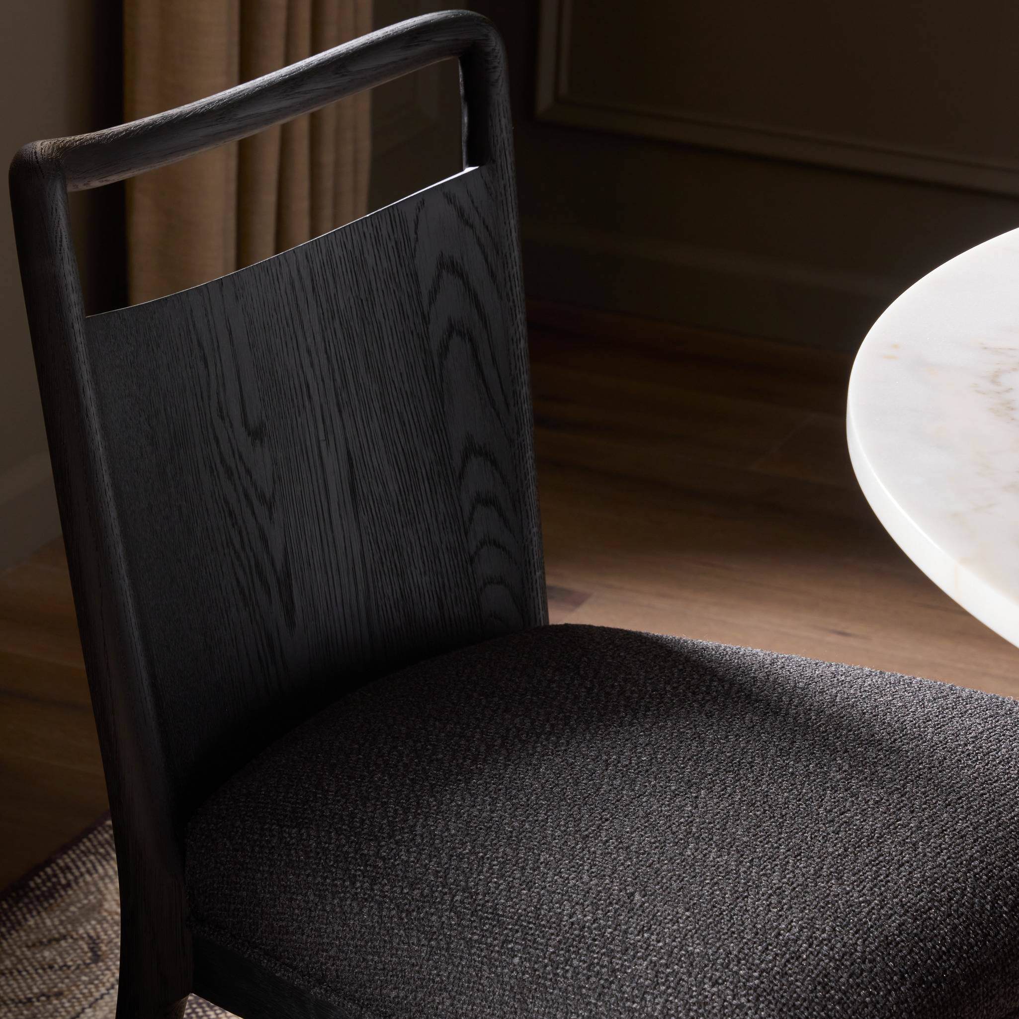 Four Hands Jessen Dining Chair Gibson in Black in dining room at Addison West.