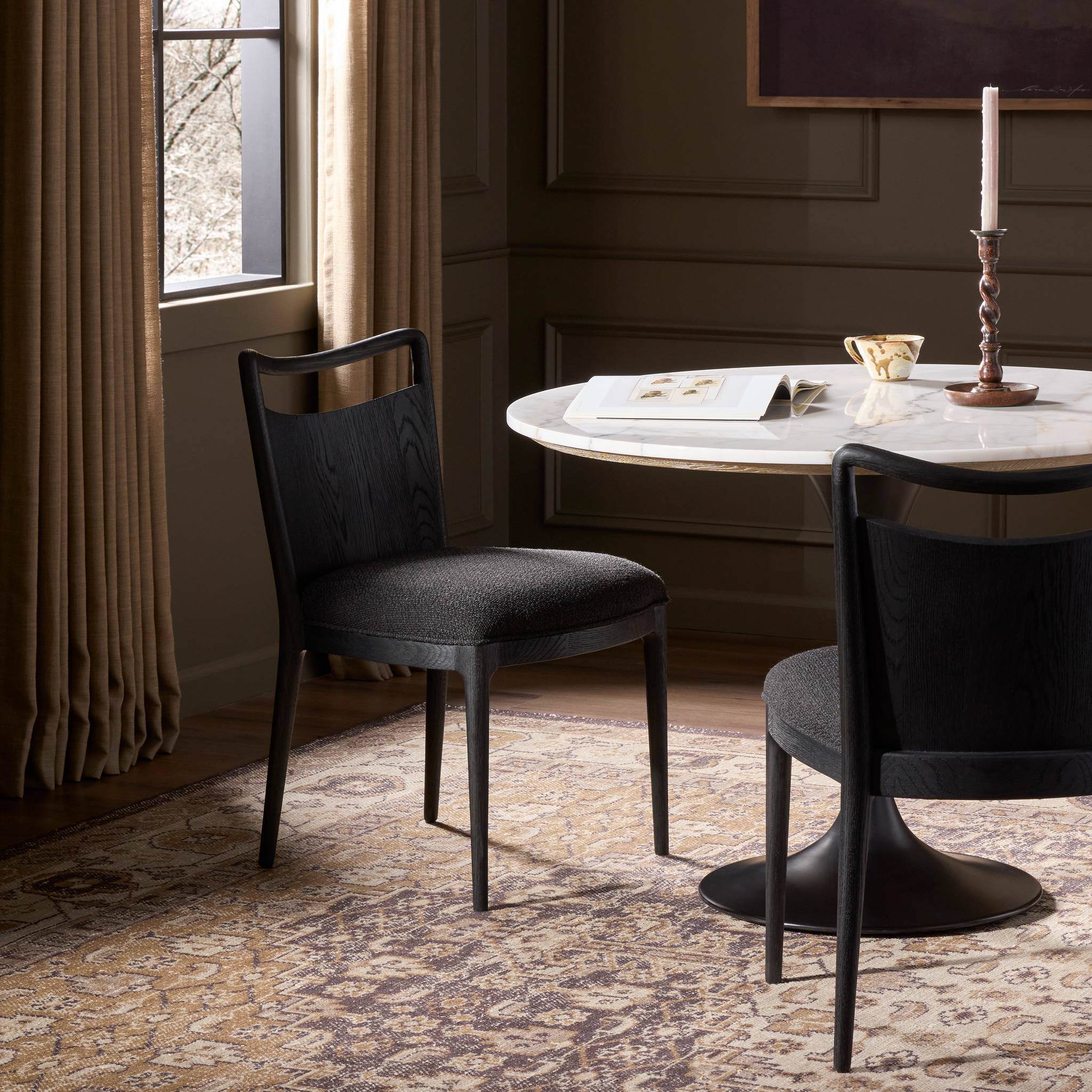 Four Hands Jessen Dining Chair Gibson in Black in dining room at Addison West.