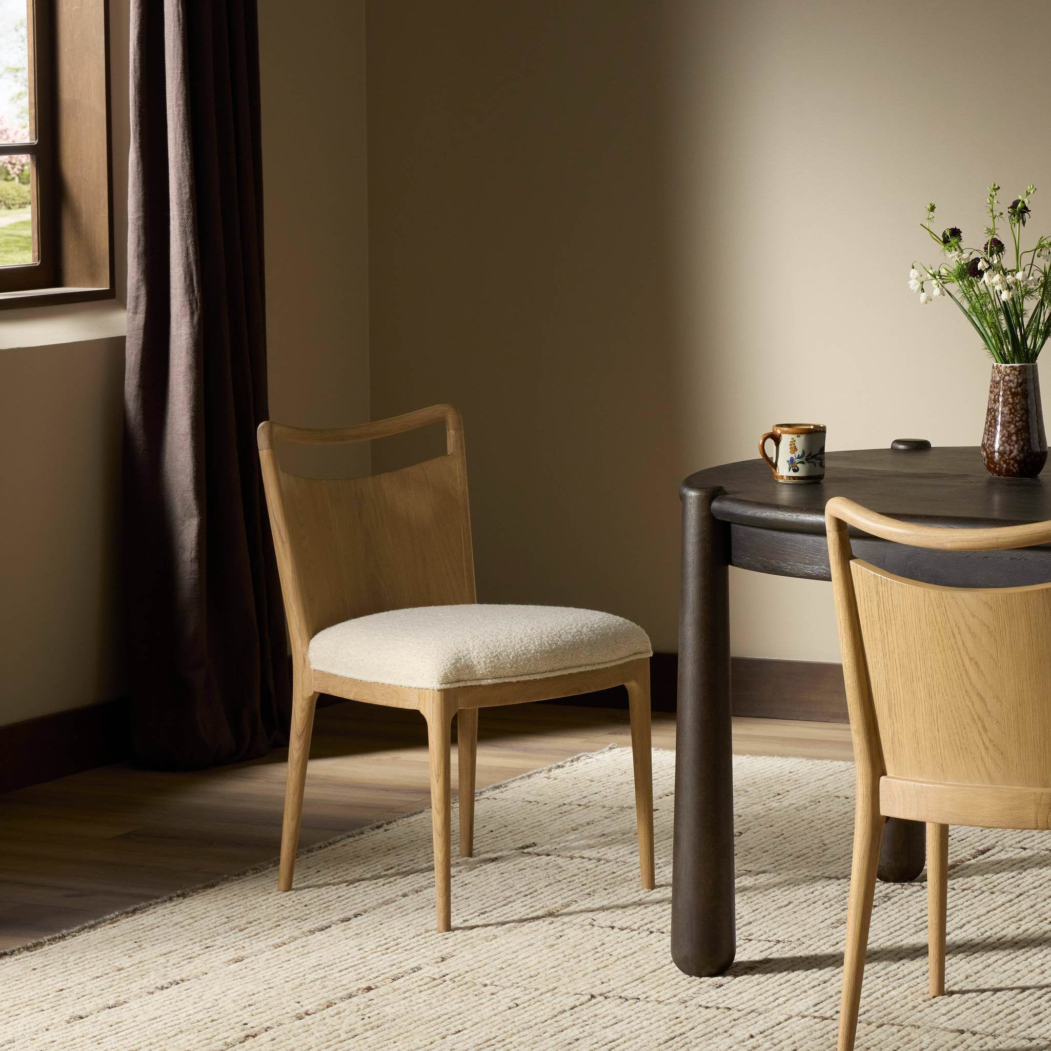 Four Hands Jessen Dining Chair Gibson in Charter Oatmeal in dining room at Addison West.