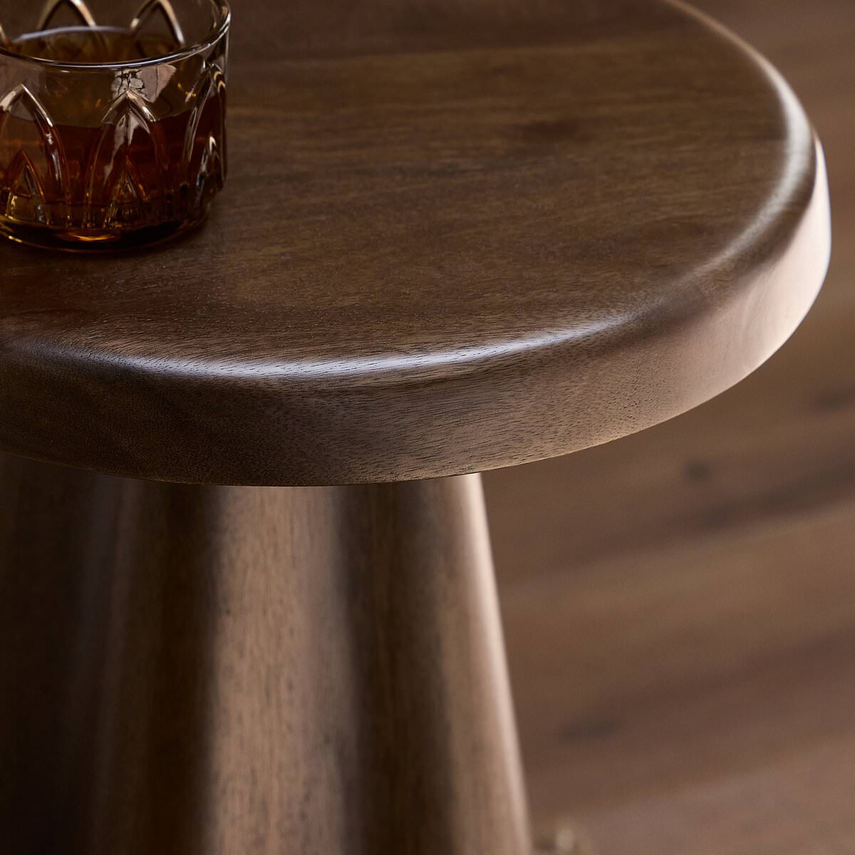 Close up of Four Hands Jinx End Table in Tawny Mango in a living room at Addison West