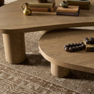 Close up of Four Hands Joji Nesting Coffee Tables in Natural Oak Veneer in a neutral living room at Addison West