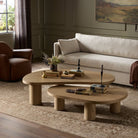 Four Hands Joji Nesting Coffee Tables in Natural Oak Veneer in a neutral living room at Addison West