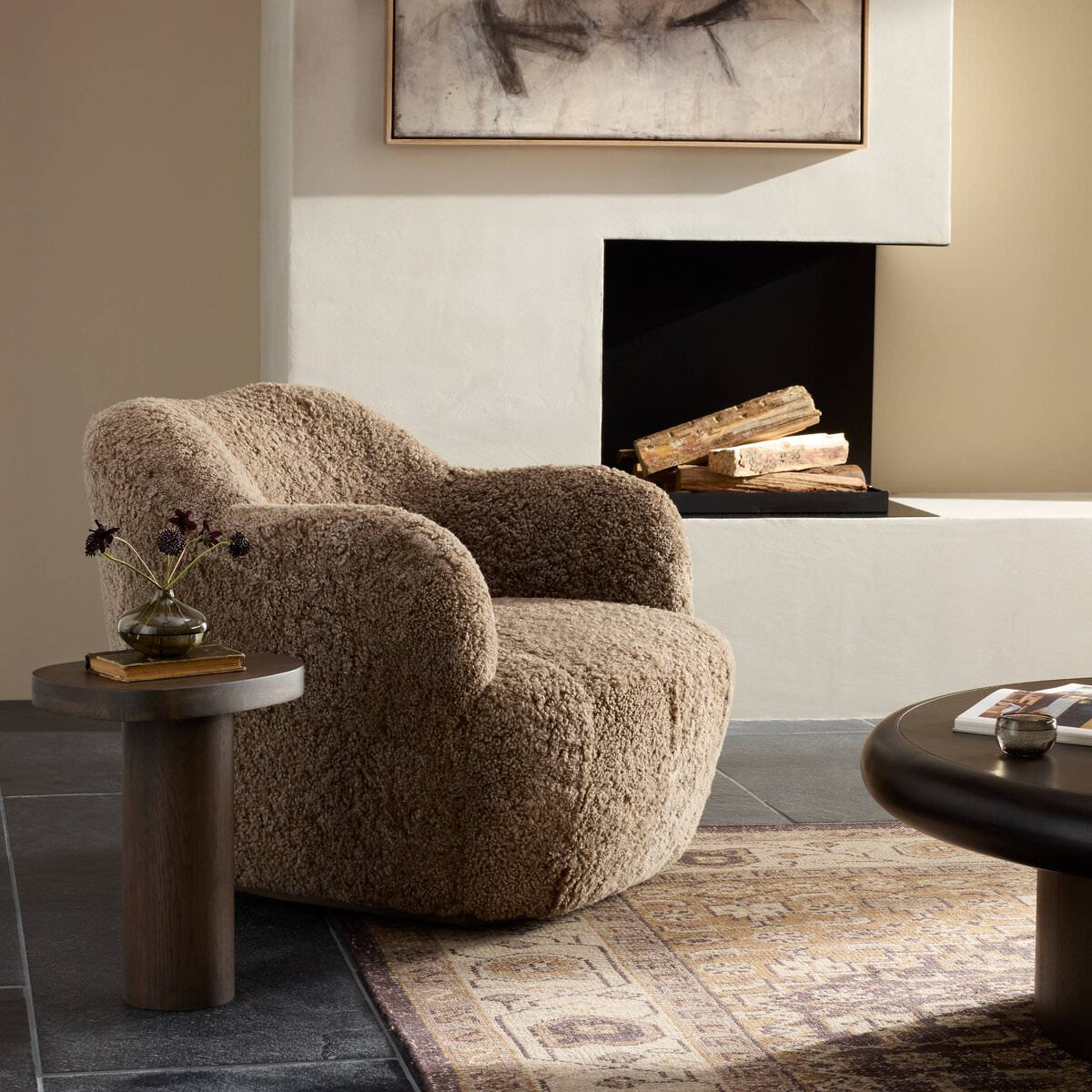 Four Hands Julius Swivel Chair in Taupe Shearling in a living room at Addison West