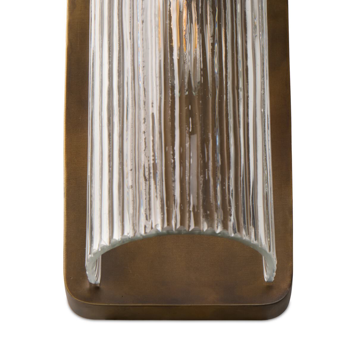 Close up of Four Hands Kenji Sconce in Clear Reeded Glass on a white background at Addison West