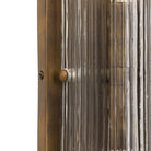 Close up of Four Hands Kenji Sconce in Clear Reeded Glass on a white background at Addison West