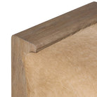 Close up of Four Hands Knox Accent Bench in Light Hair on Hide on a white background at Addison West