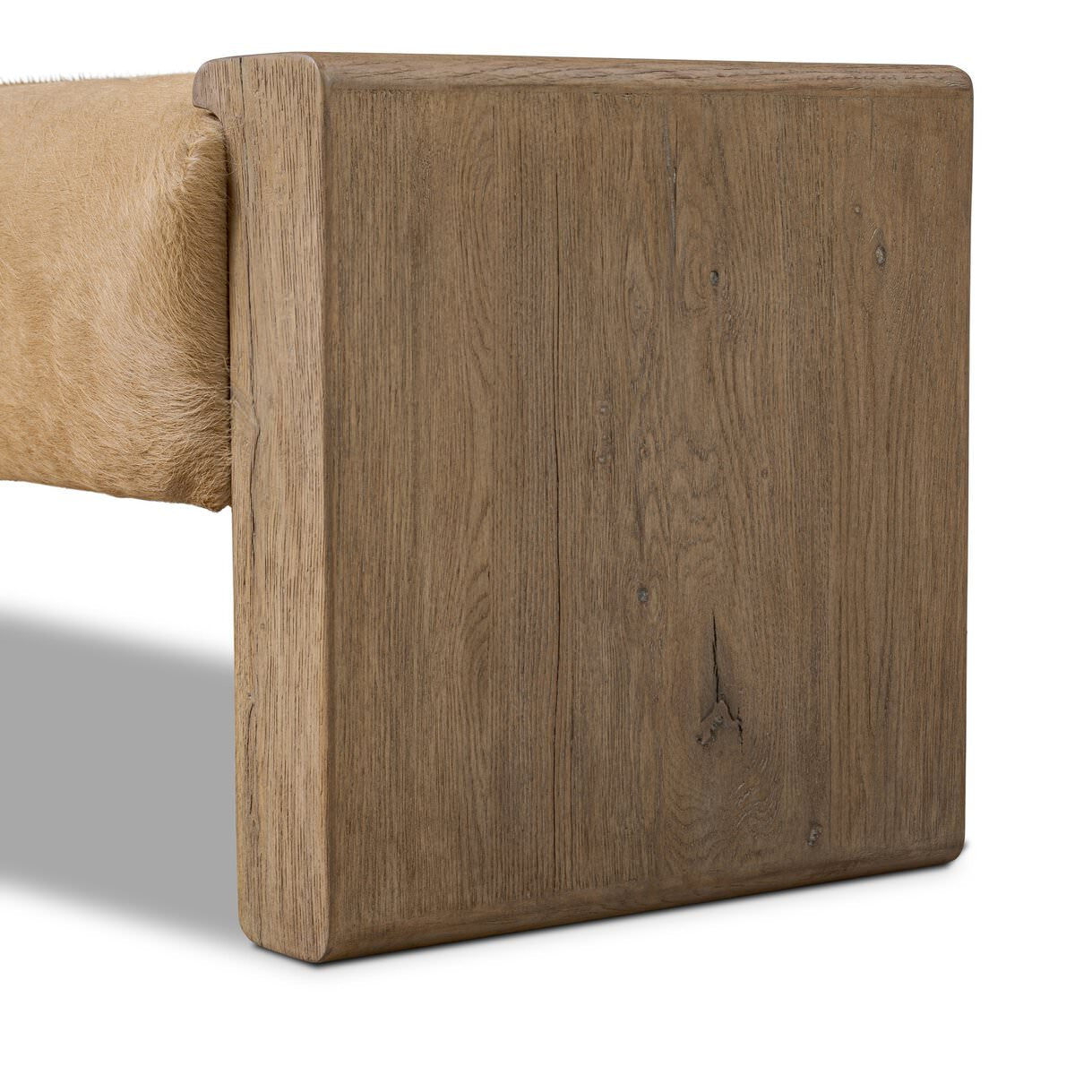 Close up of Four Hands Knox Accent Bench in Light Hair on Hide on a white background at Addison West