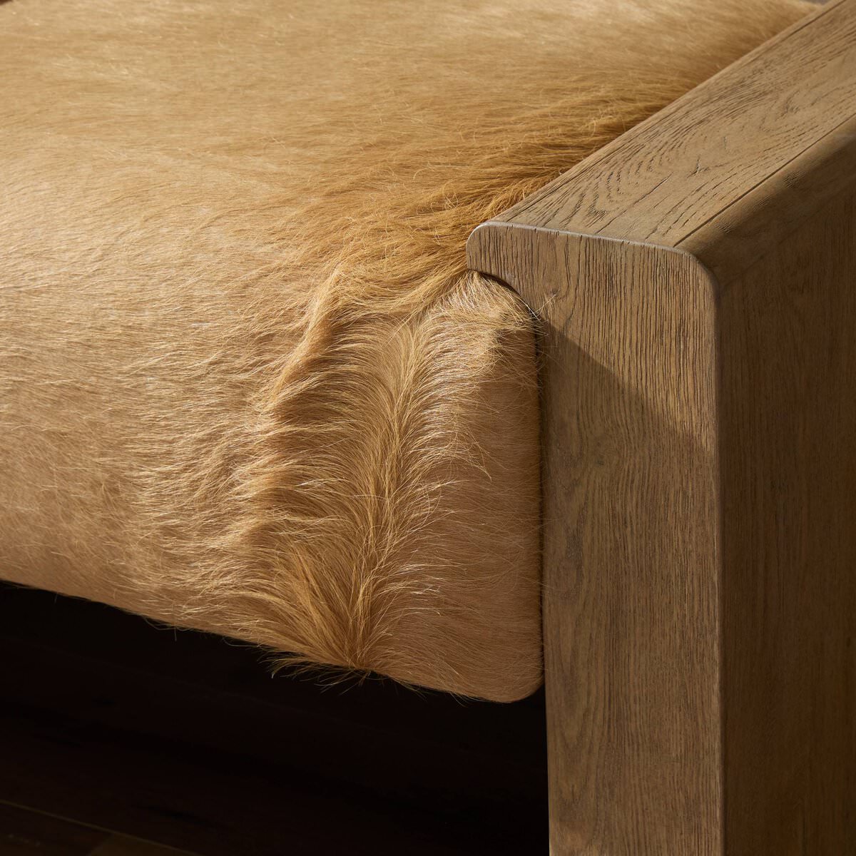 Close up of Four Hands Knox Accent Bench in Light Hair on Hide in an entryway at Addison West