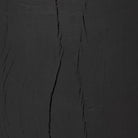 Close up of Four Hands Layo End Table in Black Resinon a white background at Addison West