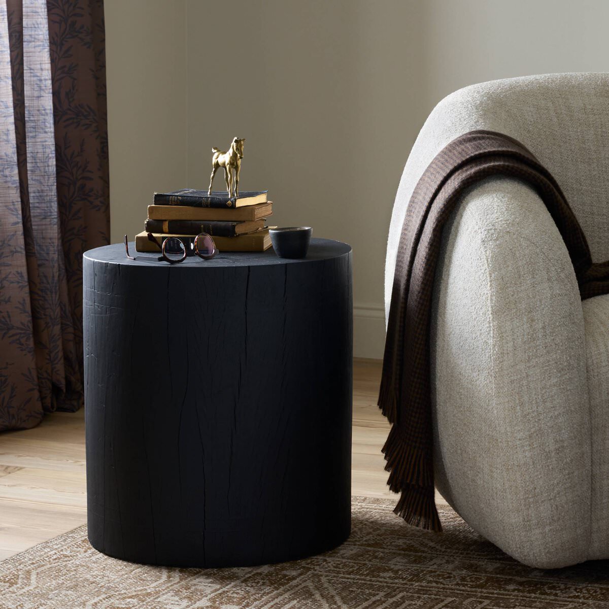 Four Hands Layo End Table in Black Resinon in a neutral living room at Addison West